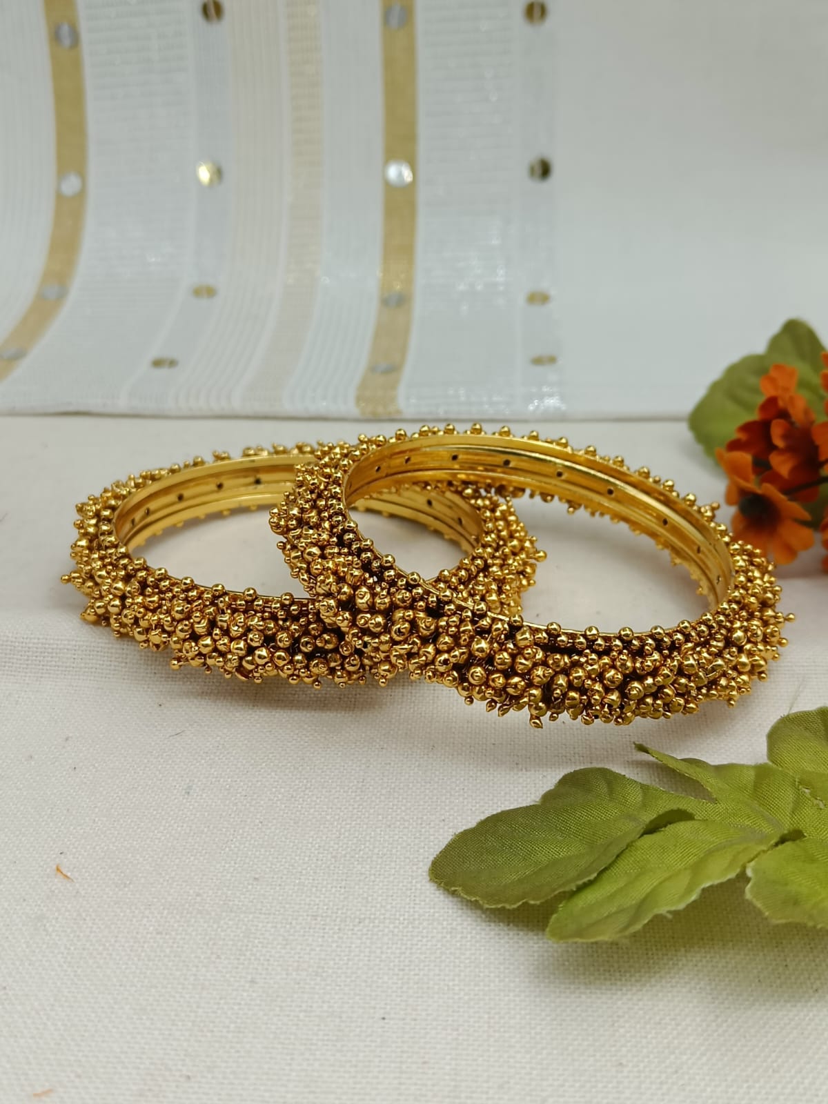 Roopmanjari Gold Plated Carved Bangle Set