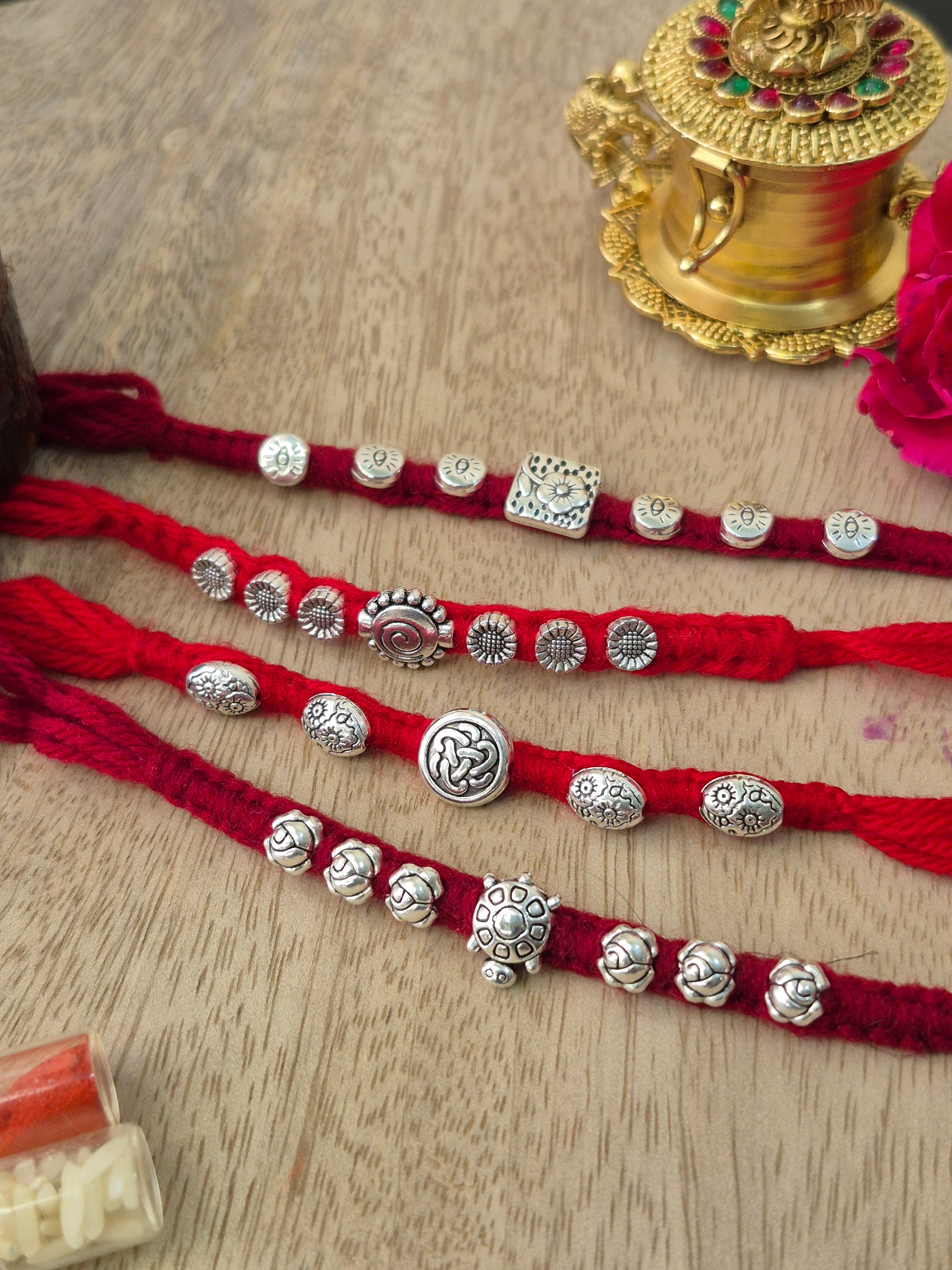 Silver Rakhis (Combo of 4)