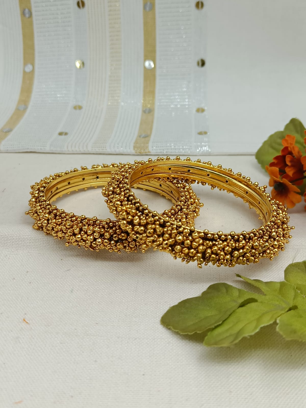 Roopmanjari Gold Plated Carved Bangle Set
